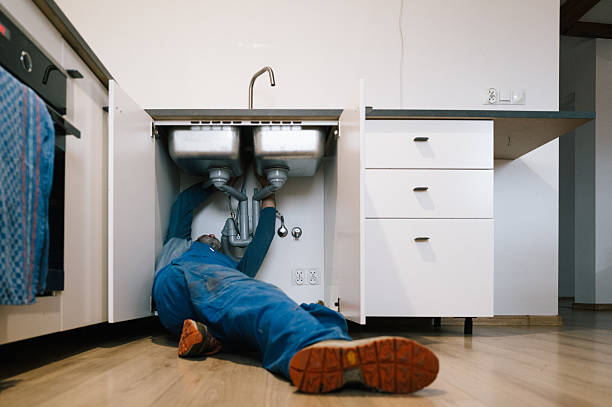 Professional Plumbing technician working in Big Lake, WA
